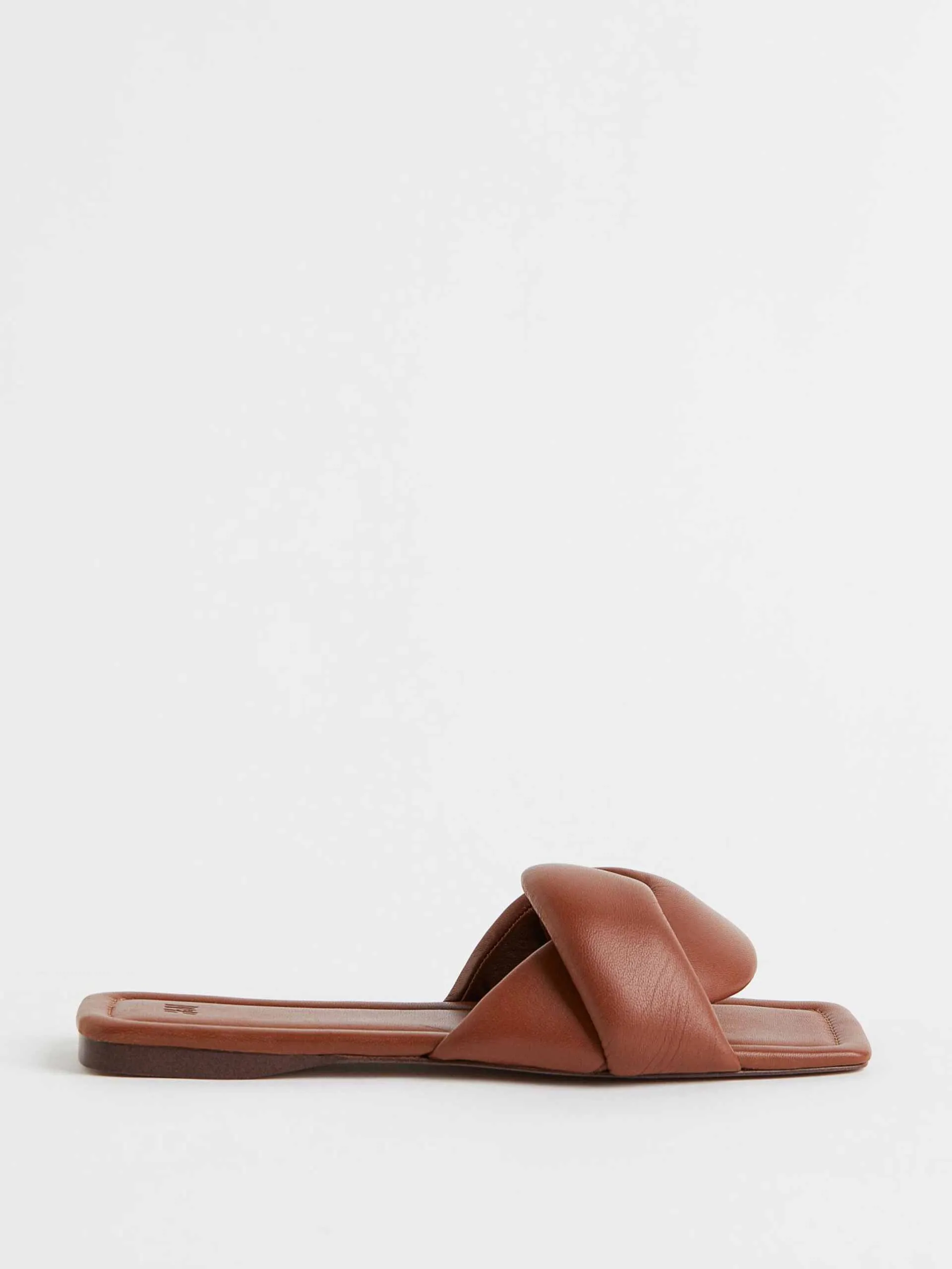 Brown leather slides